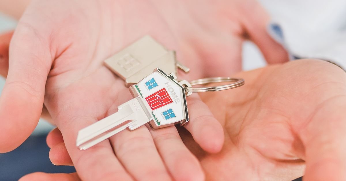 House keys resting in open hands